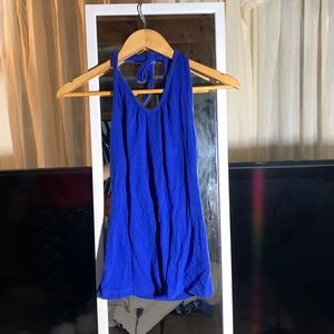 Round the neck blue halter top, size, medium, good condition.